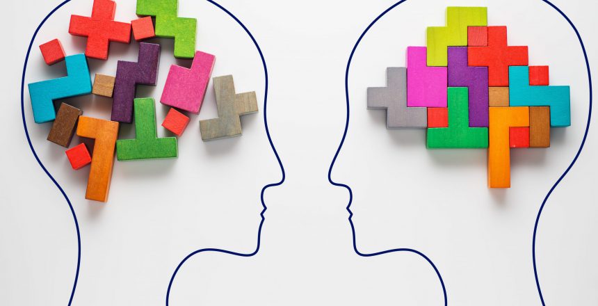 The concept of rational and irrational thinking of two people. Heads of two people with colourful shapes of abstract brain for concept of idea and teamwork. Two people with different thinking.